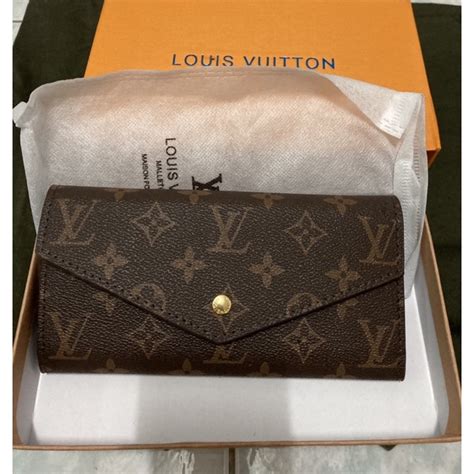 กระเป๋าสตางค์ louis vuitton ใบยาว ราคา|กระเป๋าสตางค์ โลหิต.